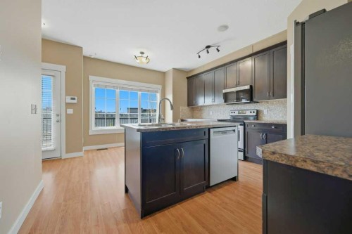 320 Rainbow Falls Drive, Chestermere, AB - Indoor Photo Showing Kitchen
