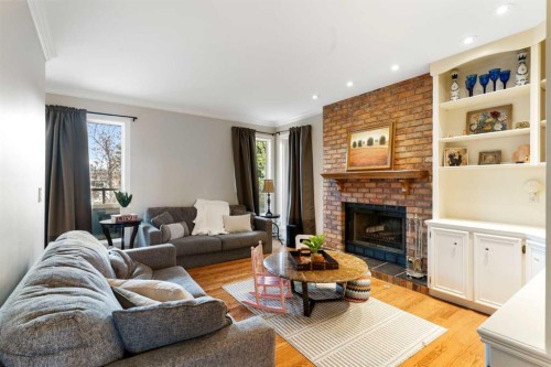 476 Silvergrove Gardens Nw, Calgary, AB - Indoor Photo Showing Living Room With Fireplace