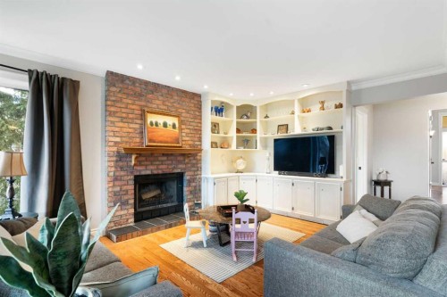 476 Silvergrove Gardens Nw, Calgary, AB - Indoor Photo Showing Living Room With Fireplace