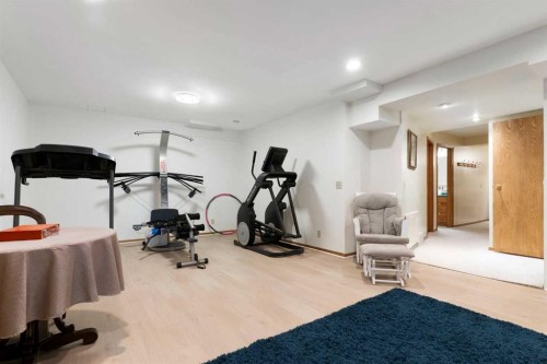 476 Silvergrove Gardens Nw, Calgary, AB - Indoor Photo Showing Gym Room