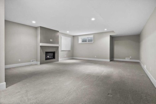 2330 25 Avenue Nw, Calgary, AB - Indoor With Fireplace