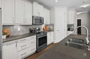 2330 25 Avenue Nw, Calgary, AB  - Indoor Photo Showing Kitchen With Stainless Steel Kitchen With Double Sink With Upgraded Kitchen 
