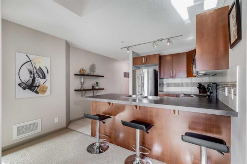 205-210 15 Avenue Se, Calgary, AB - Indoor Photo Showing Kitchen With Double Sink
