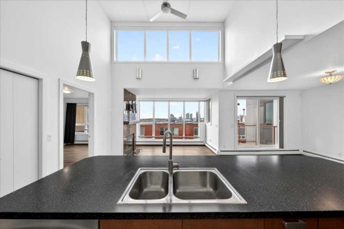 404-603 7 Avenue Ne, Calgary, AB - Indoor Photo Showing Kitchen With Double Sink