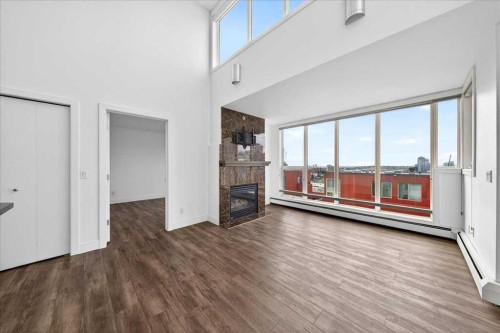 404-603 7 Avenue Ne, Calgary, AB - Indoor With Fireplace