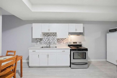 668 Cornerstone Boulevard Ne, Calgary, AB - Indoor Photo Showing Kitchen With Double Sink