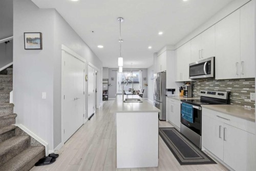 668 Cornerstone Boulevard Ne, Calgary, AB - Indoor Photo Showing Kitchen With Double Sink With Upgraded Kitchen