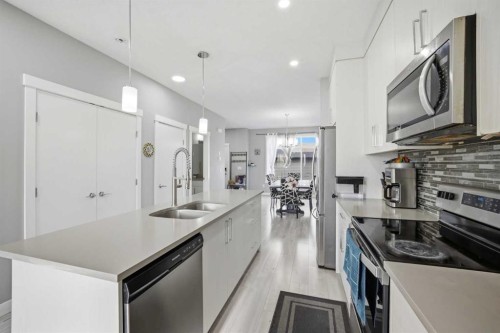668 Cornerstone Boulevard Ne, Calgary, AB - Indoor Photo Showing Kitchen With Double Sink With Upgraded Kitchen