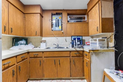 28 Beddington Crescent Ne, Calgary, AB - Indoor Photo Showing Kitchen With Double Sink