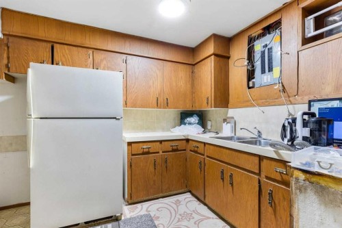 28 Beddington Crescent Ne, Calgary, AB - Indoor Photo Showing Kitchen With Double Sink