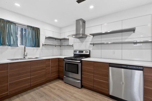 2533 9 Avenue Se, Calgary, AB - Indoor Photo Showing Kitchen With Stainless Steel Kitchen With Double Sink