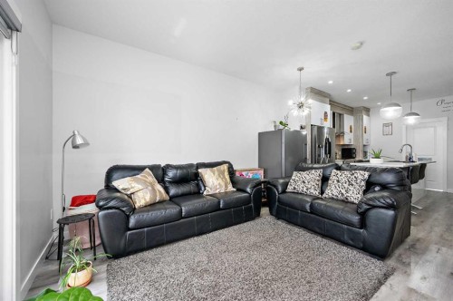 904-95 Skyview Close Ne, Calgary, AB - Indoor Photo Showing Living Room