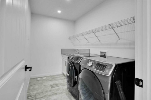 248 Sandpiper Boulevard, Chestermere, AB - Indoor Photo Showing Laundry Room