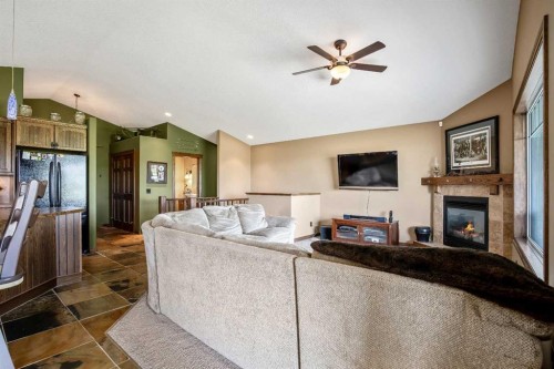 37 Wyndham Park Way, Carseland, AB - Indoor Photo Showing Living Room With Fireplace