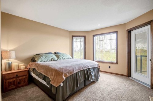 37 Wyndham Park Way, Carseland, AB - Indoor Photo Showing Bedroom