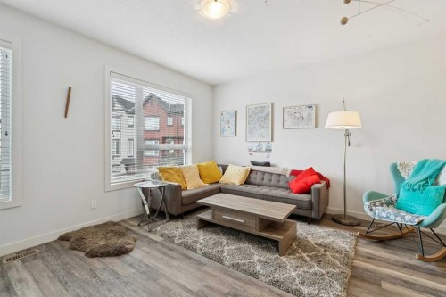 108-11 Evanscrest Mews Nw, Calgary, AB - Indoor Photo Showing Living Room