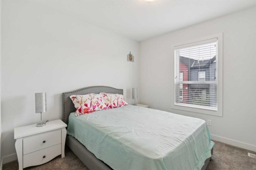 108-11 Evanscrest Mews Nw, Calgary, AB - Indoor Photo Showing Bedroom