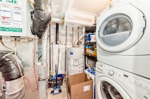 92 Everstone Rise Sw, Calgary, AB - Indoor Photo Showing Laundry Room