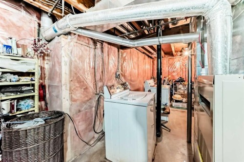 952 Applewood Drive Se, Calgary, AB - Indoor Photo Showing Laundry Room