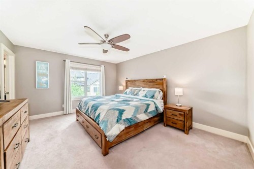 228 Cranston Drive Se, Calgary, AB - Indoor Photo Showing Bedroom