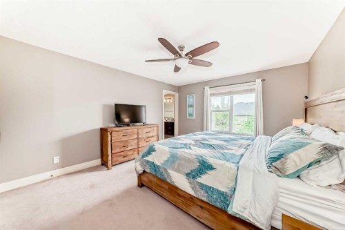 228 Cranston Drive Se, Calgary, AB - Indoor Photo Showing Bedroom