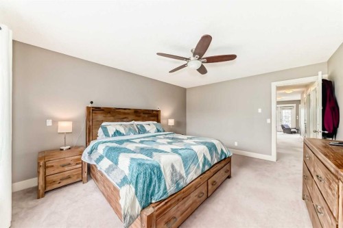 228 Cranston Drive Se, Calgary, AB - Indoor Photo Showing Bedroom