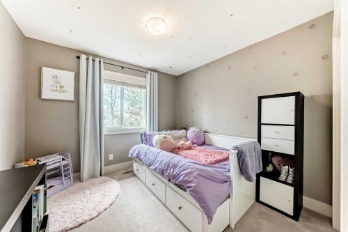 228 Cranston Drive Se, Calgary, AB - Indoor Photo Showing Bedroom