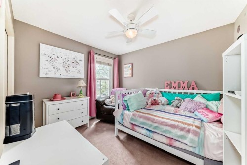 228 Cranston Drive Se, Calgary, AB - Indoor Photo Showing Bedroom