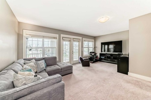 228 Cranston Drive Se, Calgary, AB - Indoor Photo Showing Living Room