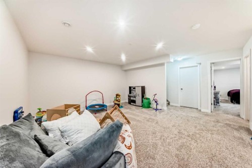 228 Cranston Drive Se, Calgary, AB - Indoor Photo Showing Basement