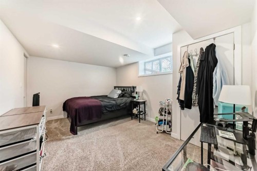 228 Cranston Drive Se, Calgary, AB - Indoor Photo Showing Bedroom