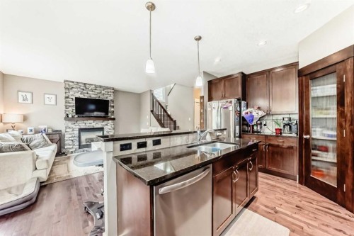 228 Cranston Drive Se, Calgary, AB - Indoor With Fireplace