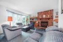 3623 54 Avenue Sw, Calgary, AB  - Indoor Photo Showing Living Room With Fireplace 