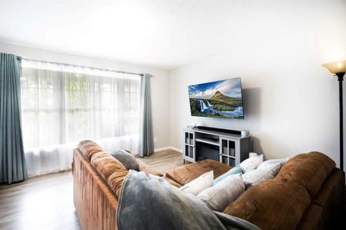 1460 Carrington Boulevard Nw, Calgary, AB - Indoor Photo Showing Living Room