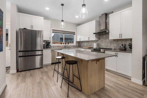 315 Wolf Creek Way Se, Calgary, AB - Indoor Photo Showing Kitchen With Upgraded Kitchen