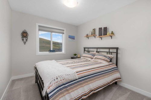 315 Wolf Creek Way Se, Calgary, AB - Indoor Photo Showing Bedroom