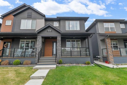 315 Wolf Creek Way Se, Calgary, AB - Outdoor With Deck Patio Veranda With Facade