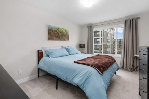 315 Wolf Creek Way Se, Calgary, AB - Indoor Photo Showing Bedroom