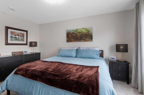 315 Wolf Creek Way Se, Calgary, AB - Indoor Photo Showing Bedroom