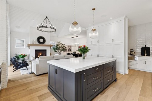1119 Riverdale Avenue Sw, Calgary, AB - Indoor Photo Showing Kitchen With Fireplace