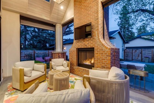 1119 Riverdale Avenue Sw, Calgary, AB -  With Fireplace With Deck Patio Veranda With Exterior