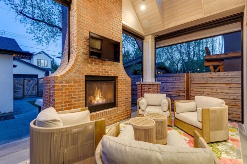 1119 Riverdale Avenue Sw, Calgary, AB - Outdoor With Fireplace With Deck Patio Veranda With Exterior
