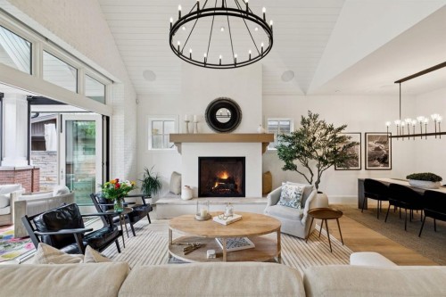 1119 Riverdale Avenue Sw, Calgary, AB - Indoor Photo Showing Living Room With Fireplace