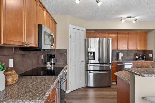 130 Morningside Point Sw, Airdrie, AB - Indoor Photo Showing Kitchen With Stainless Steel Kitchen