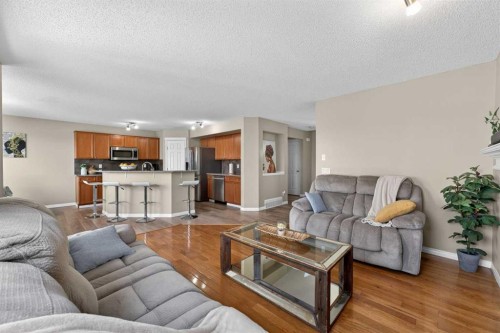 130 Morningside Point Sw, Airdrie, AB - Indoor Photo Showing Living Room