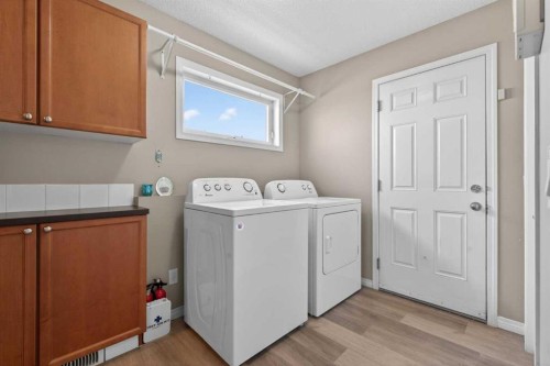 130 Morningside Point Sw, Airdrie, AB - Indoor Photo Showing Laundry Room