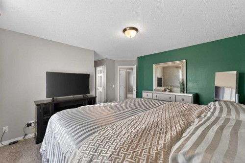 130 Morningside Point Sw, Airdrie, AB - Indoor Photo Showing Bedroom