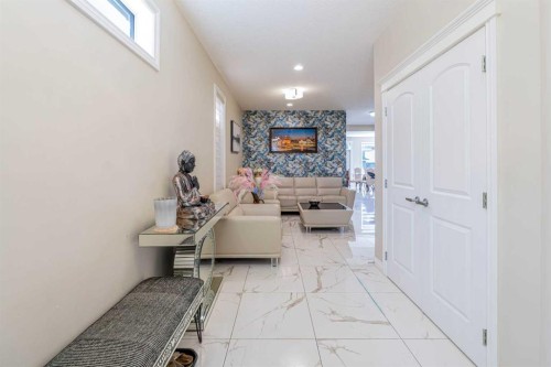 19 Red Sky Gardens Ne, Calgary, AB - Indoor Photo Showing Other Room With Fireplace