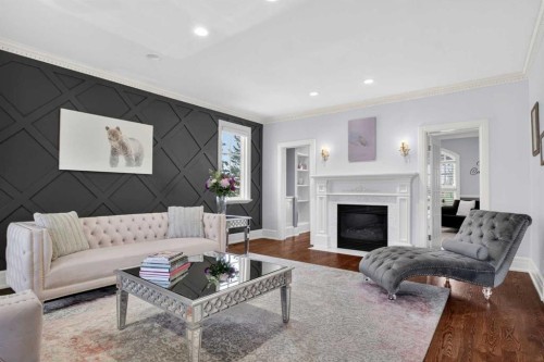 22 Ridge Pointe, Heritage Pointe, AB - Indoor Photo Showing Living Room With Fireplace