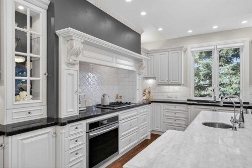22 Ridge Pointe, Heritage Pointe, AB - Indoor Photo Showing Kitchen With Upgraded Kitchen